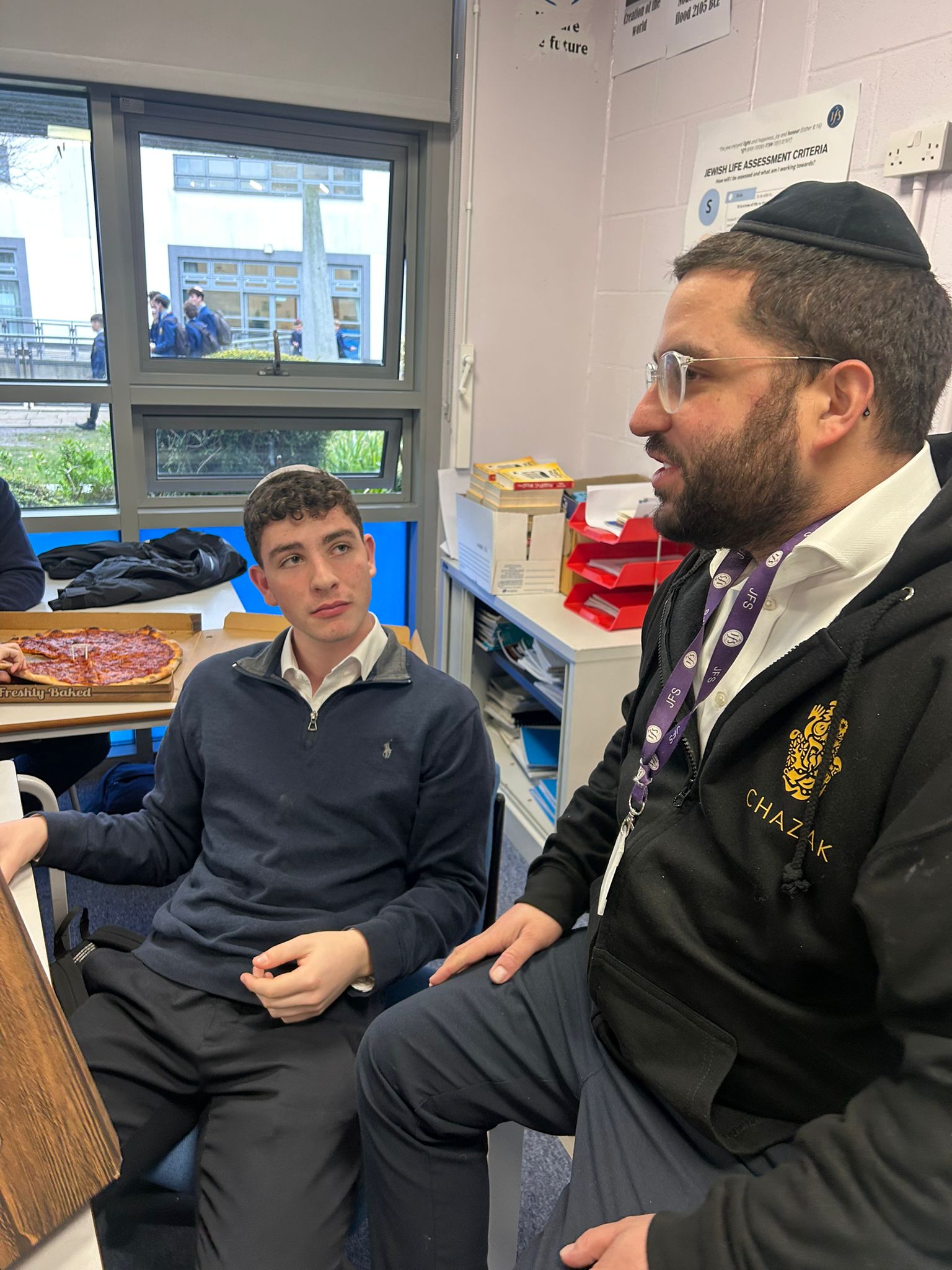 Rabbi Aidyn in a one-to-one mentoring conversation